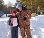 Тренер Толмачев АВ и самый младший член команды Григоренко Никита